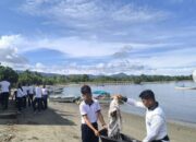 Jumat Berkah Lanal Nabire Lakukan Bersih Bersih Pantai Labani, Kolaborasi dengan Pemprov Papua Tengah